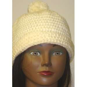   Two Ply Ivory Color Imported Wool Rollup Skull Cap: Toys & Games