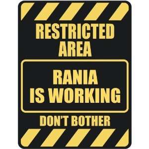  RESTRICTED AREA RANIA IS WORKING  PARKING SIGN: Home 