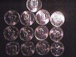 This is a set of 12 2000 dated Somalia 10 shillings animal zodiac 
