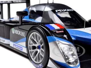 : Brand new 1:18 scale diecast model car of Peugeot 908 HDI FAP 