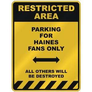  RESTRICTED AREA  PARKING FOR HAINES FANS ONLY  PARKING 