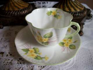 SHELLEY YELLOW GREEN TEA CUP AND SAUCER DAINTY PRIMROSE  