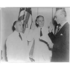  Being sworn in,US Flag,3 men,right hands raised