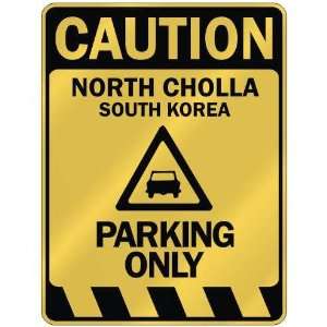   CAUTION NORTH CHOLLA PARKING ONLY  PARKING SIGN SOUTH 