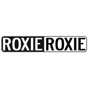   NEGATIVE ROXIE  STREET SIGN