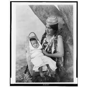  Hupa mother,holding baby,c1923,Edward S Curtis,photographer 