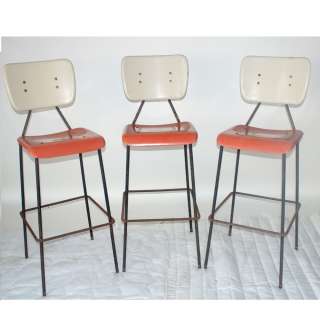   stool fiberglass seating white back rests and orange fiberglass seats