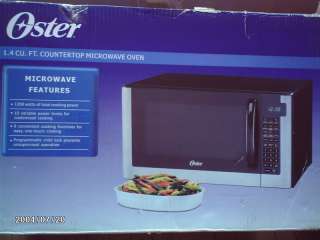 Oster 1.4 cu. ft. 1200W Counter Microwave Oven OGG61403  