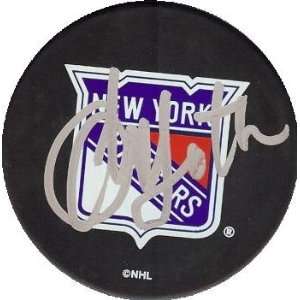 Glen Sather autographed Hockey Puck (New York Rangers)